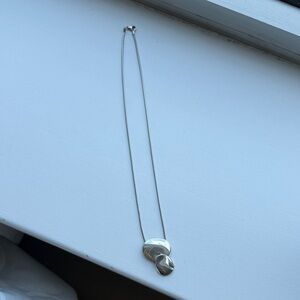 Sleek Silver Knot Pendant Necklace